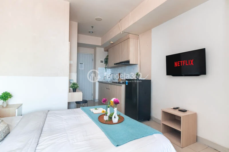 Bedroom High Floor Studio Apartment with City View at Grand Kamala Lagoon Apartment