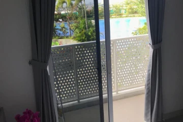 Balcony Studio The Crest West Vista Puri Apartment at Low Floor