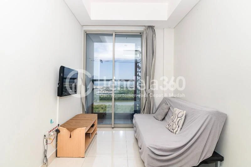 Living Room Middle Floor 2BR Apartment with City View at Gold Coast Apartment