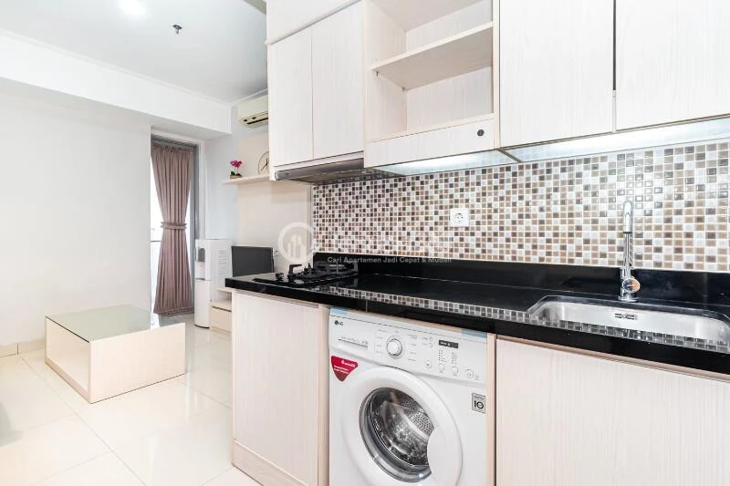 Kitchen High Floor 2BR Apartment with city View at The Mansion Kemayoran Bougenville
