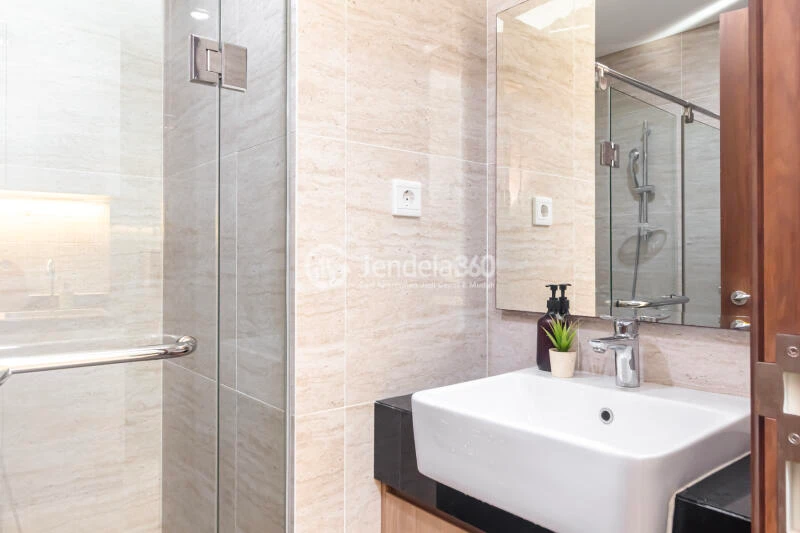 Bathroom Cozy 2BR Apartment High Floor with  View at Southgate Residence