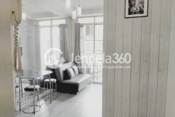 Living Room 1BR Gardenia Boulevard Apartment at Middle Floor
