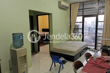 Living Room High Floor 2BR Apartment with City View at Salemba Residence