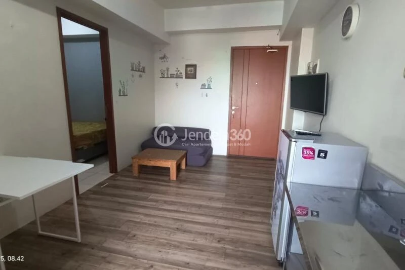 Living Room 1BR Green Lake View Apartment at Tower E
