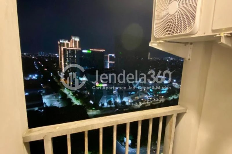 Balcony Restful Studio Apartment Low Floor with  View at Tifolia Apartment