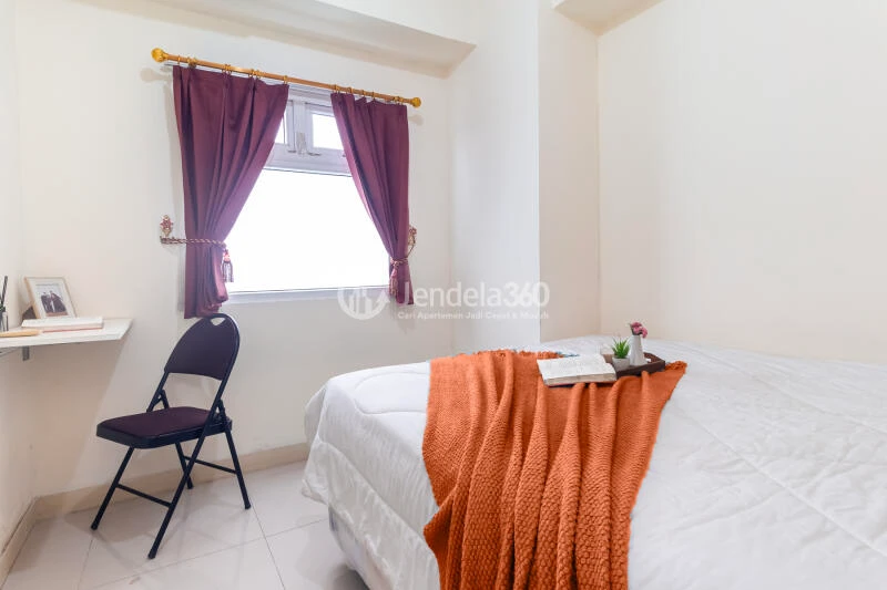 Bedroom 1 Low Floor 2BR Apartment with Swimming Pool View at Green Pramuka City Apartment