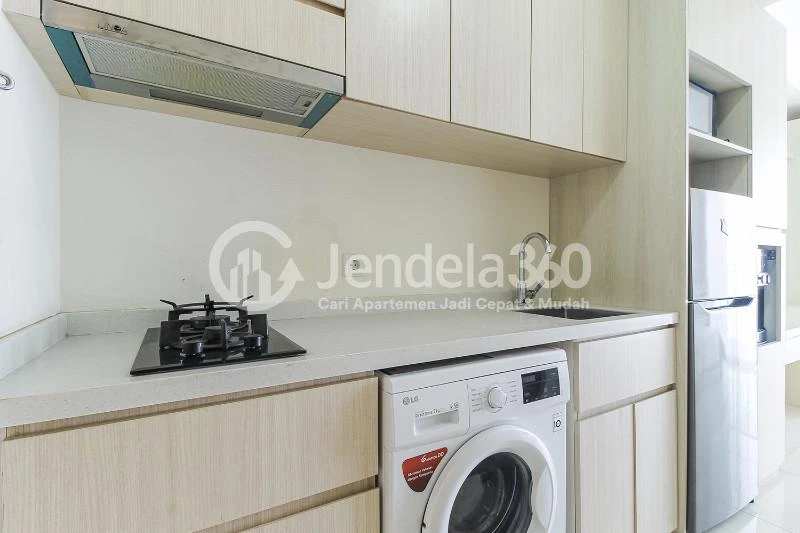 Kitchen Furnished Studio Apartment with City View at Sedayu City Apartment