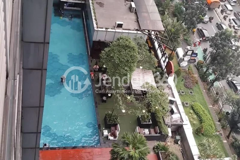 Balcony Homey Studio Apartment at Tamansari The Hive Middle Floor