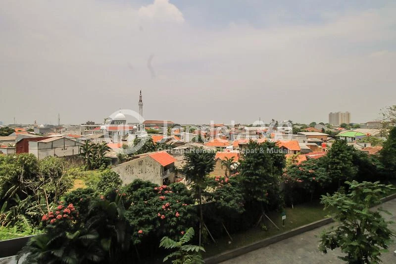 Balcony A Riverside Studio Apartment with City View at Puri Mansion