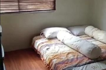Bedroom 1 Middle Floor 1BR Apartment with City View at Aston Marina Ancol