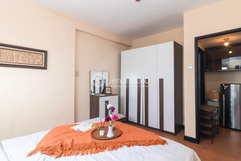 Bedroom 1BR Apartment with City View at The Wave Apartment