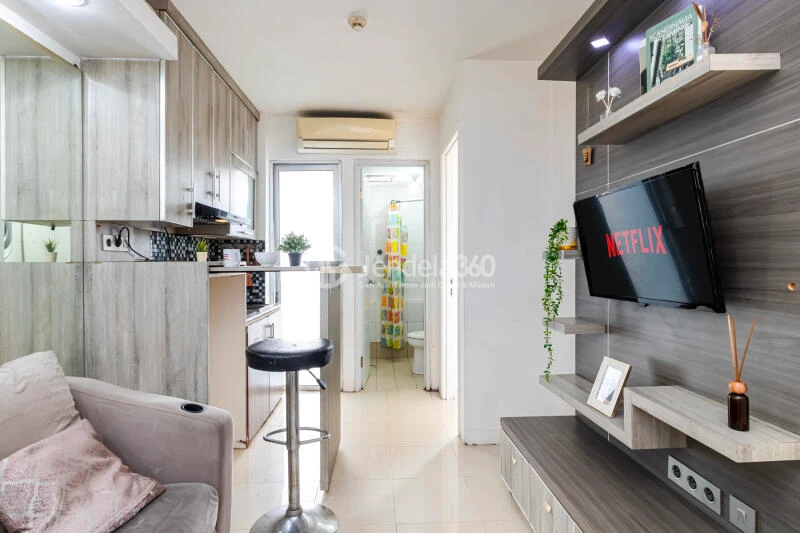 Living Room Cozy 2BR Apartment at Bassura City Apartment Close to McDonald's Duren Sawit