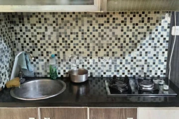 Kitchen Modern 2BR Apartment at Kalibata City Green Palace Tower Mawar