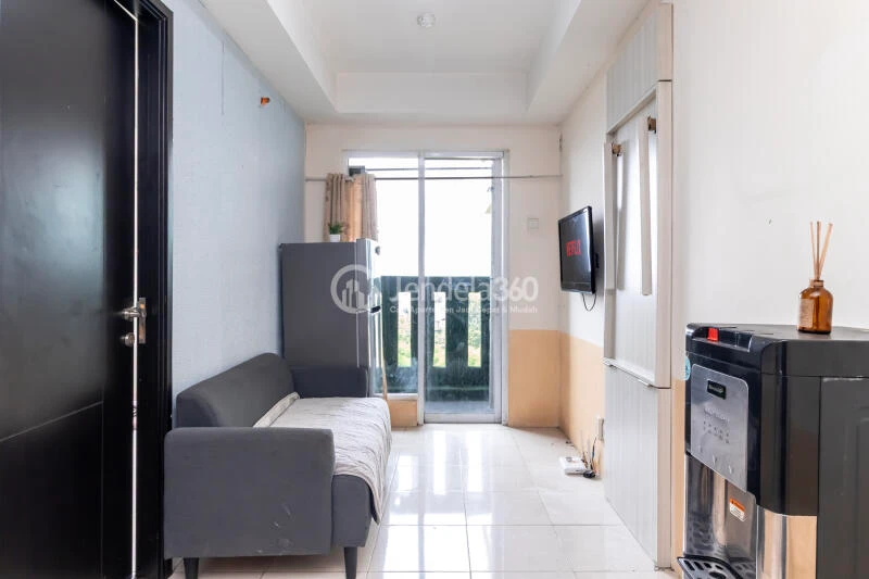 Living Room 1BR Apartment with City View at Belmont Residence