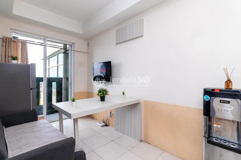 Living Room 1BR Apartment with City View at Belmont Residence