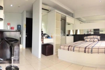Bedroom Homey Studio Apartment Low Floor with City View at Gardenia Boulevard Apartment