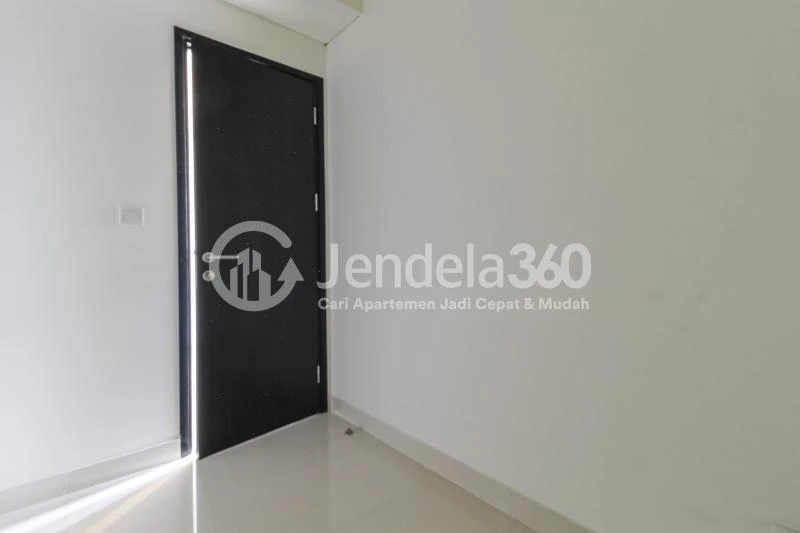 Bedroom 2 1BR + 1 Apartment with City View at Westmark Apartment