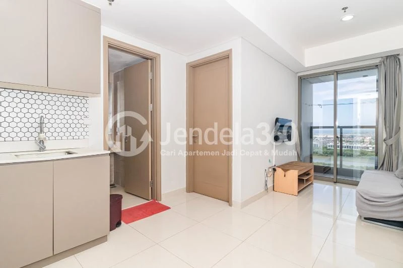 Living Room Middle Floor 2BR Apartment with City View at Gold Coast Apartment