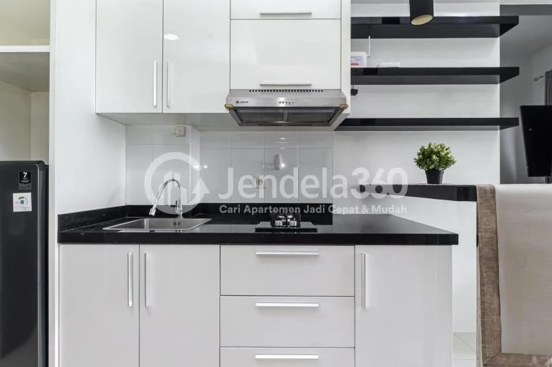 Kitchen Homey 1BR Apartment at Westmark Apartment Middle Floor