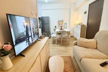 Living Room 1BR Loftvilles City Apartment at Tower buchida 3