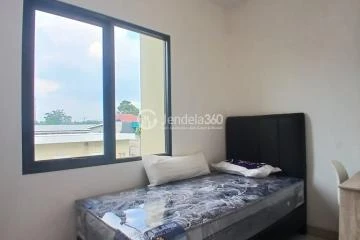 Bedroom 2 2BR Apartment with City View at EcoHome Citra Raya
