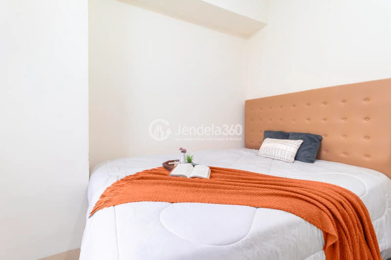 Bedroom 1 Low Floor 2BR Apartment with Swimming Pool View at Green Pramuka City Apartment