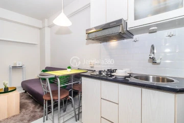 Kitchen 2BR Kalibata City Apartment at Low Floor