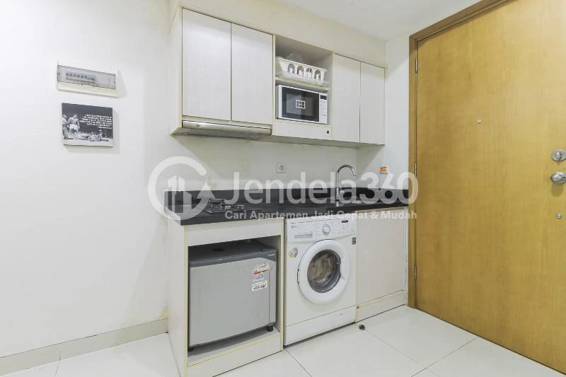 Kitchen Middle Floor 1BR Apartment with Golf view View at The Mansion Kemayoran Bougenville