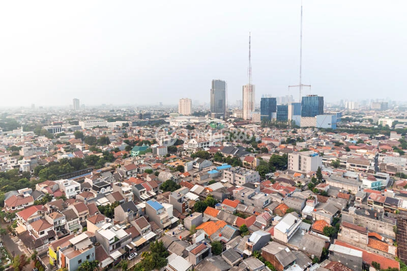 Balcony Strategic Location 2BR Apartment Middle Floor with City View at Maqna Residence