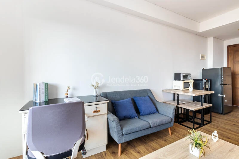 Living Room 2BR Aspen Residence Apartment at Middle Floor with An Eye Pleasing Interior