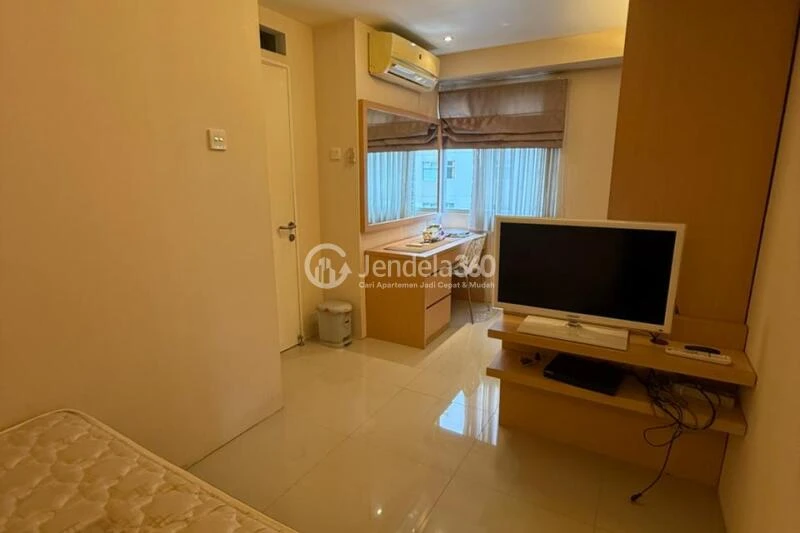 Bedroom Low Floor 1BR Apartment with City View at Kalibata City Apartment