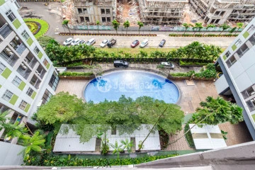 Balcony Low Floor 2BR Apartment with City View at Serpong Green View Apartment