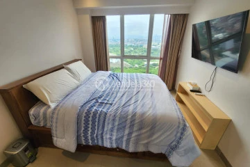 Bedroom 2 Tidy 2BR Apartment High Floor with City View at Callia Apartment