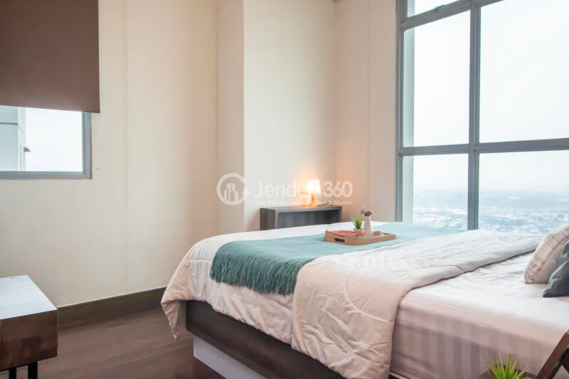 Bedroom 1 High Floor 2BR Apartment with City View at Puri Orchard Apartment