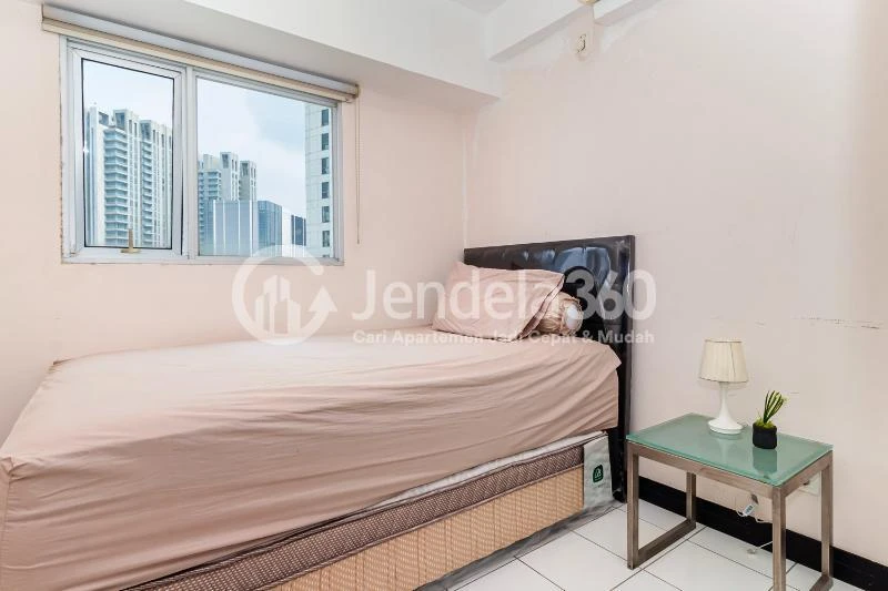 Bedroom 2 Fancy 2BR Apartment at The Wave Apartment Tower Coral