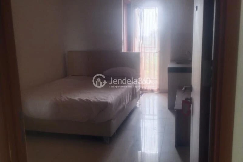 Bedroom Low Floor Studio Apartment with Water Park View at Green Lake View Depok Apartment