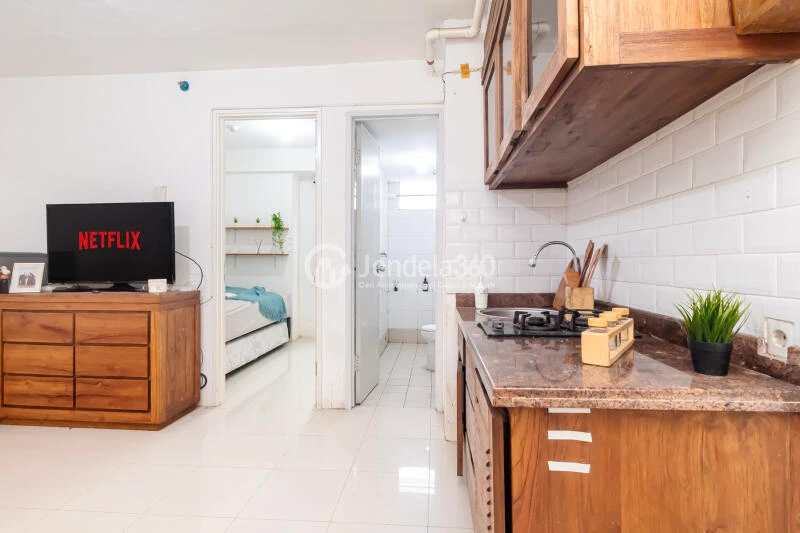Living Room High Floor 3BR Apartment with City view View at Bassura City Apartment