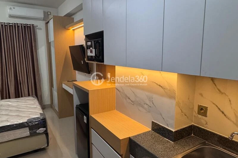 Kitchen Fancy Studio Apartment at Transpark Cibubur Apartment Low Floor