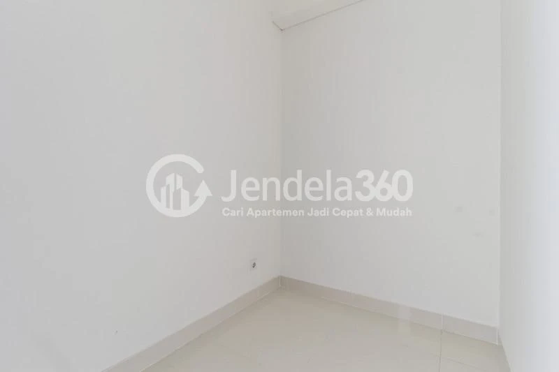 Bedroom 2 1BR + 1 Apartment with City View at Westmark Apartment
