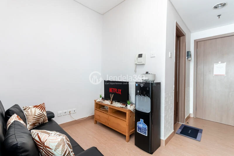 Living Room Peaceful 1BR Apartment at Puri Orchard Apartment Low Floor
