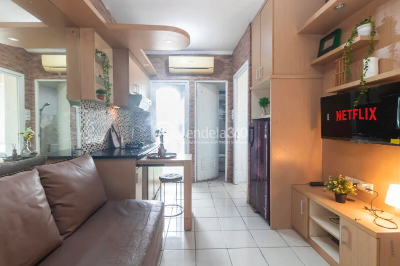 Living Room Relaxed 2BR Apartment Low Floor with  View at Green Pramuka City Apartment