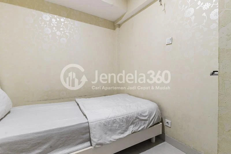 Bedroom 2 Peaceful 2BR Apartment with Elegant Modern Interior at Puri Park View Apartment
