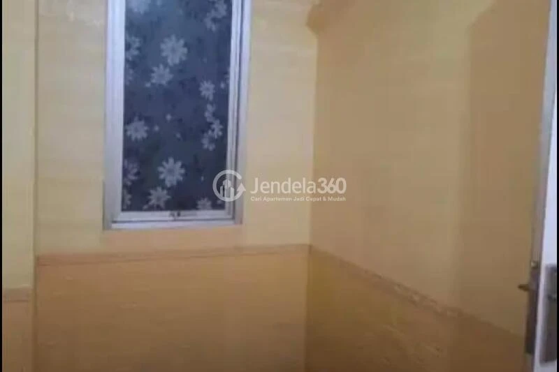 Bedroom 2 Fancy 2BR Apartment Low Floor with  View at Delta Cakung Apartment