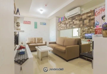 Living Room 2BR Apartment with Swimming pool View at Sky Terrace Apartment
