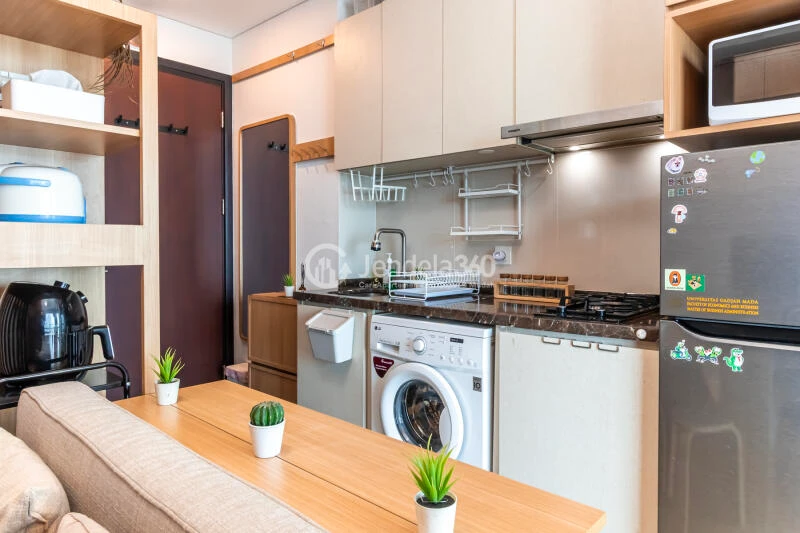 Kitchen Affordable 1BR Apartment High Floor with city View at Puri Mansion