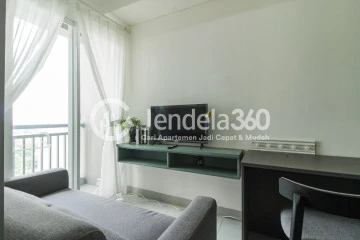 Living Room Low Floor 1BR Apartment with Swimming Pool View at Akasa Pure Living Apartment