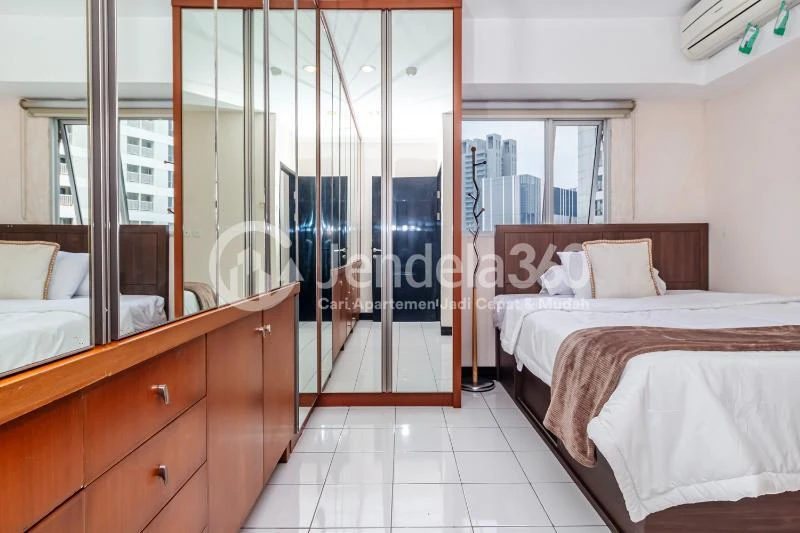 Bedroom 1 Fancy 2BR Apartment at The Wave Apartment Tower Coral