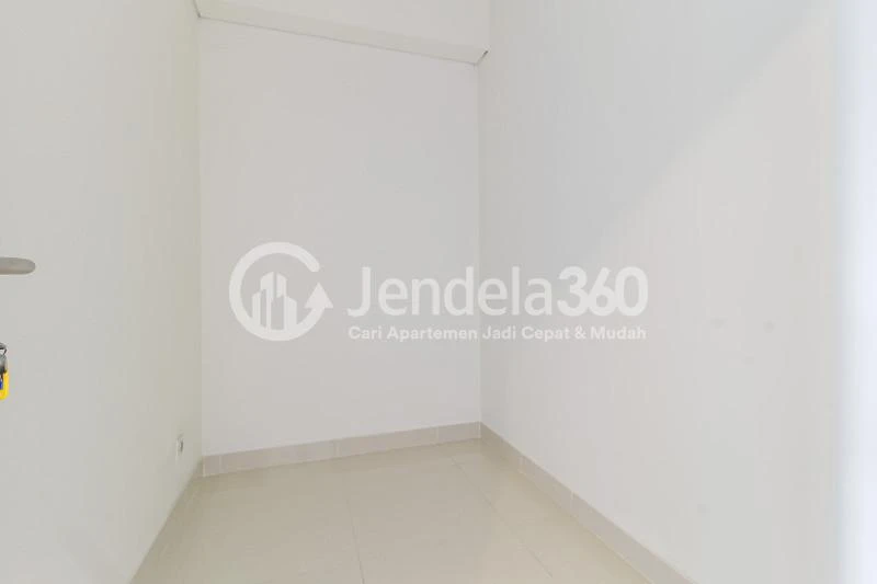 Bedroom 2 1BR + 1 Apartment with City View at Westmark Apartment