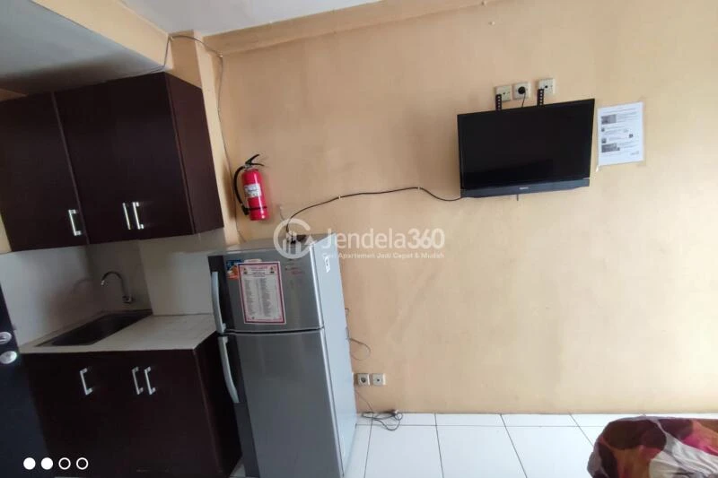Bedroom Low Floor Studio Apartment with Swimming Pool View at Paragon Village Apartment