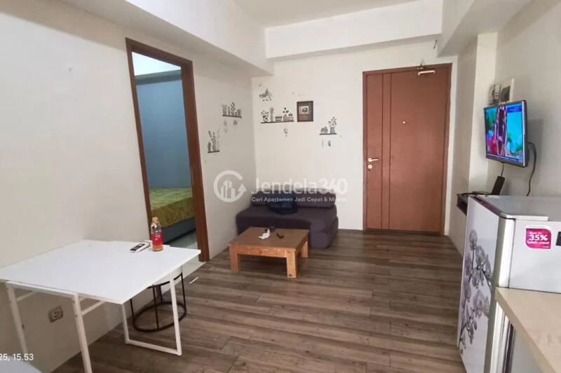 Living Room 1BR Green Lake View Apartment at Tower E